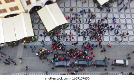 TILT SHIFT EFFECT - Old Town square with tourist crowd in Prague, Czech Republic, view from above.