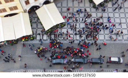 TILT SHIFT EFFECT - Old Town square with tourist crowd in Prague, Czech Republic, view from above.