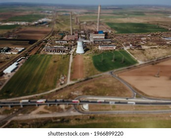 Tilt Shift Of An Old Coal Power Plant Chimney Old Color Graded Aerial View