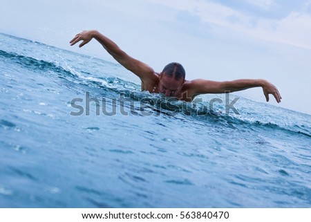 Similar – Image, Stock Photo Handstand on the sea Jump