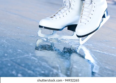 Tilted blue version, ice skates with reflection