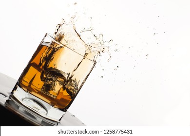 Tilted Glass Splashing Whiskey Ice Isolated Stock Photo 1258775431 ...