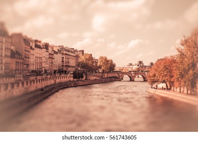 Tilt-shift miniature view of the River Seine from Paris with vintage filter effect