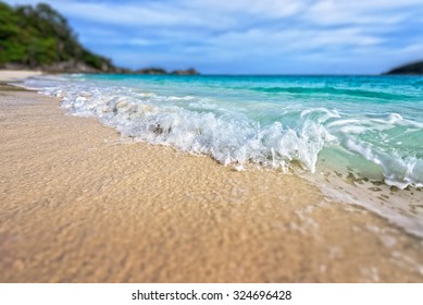 Tilt-Shift soft blur effect beautiful landscape blue sea white sand and waves on the beach during summer at Koh Miang island in Mu Ko Similan National Park, Phang Nga province, Thailand