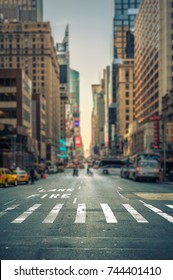 Tilt-shift view of a crosswalk in a New-York city avenue, USA