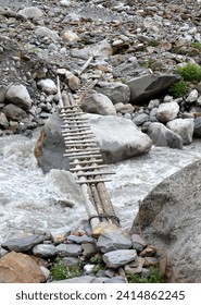 Timber bridge. The framework of timber bridges consists of a deck, main support members, and railings.
