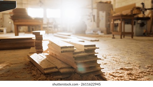 Timber, plank and carpentry in empty workshop for furniture manufacturing, renovation and labor. Materials, wood and crafting production with woodwork, remodeling maintenance and restoration industry