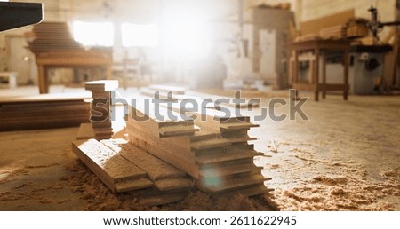Timber, plank and carpentry in empty workshop for furniture manufacturing, renovation and labor. Materials, wood and crafting production with woodwork, remodeling maintenance and restoration industry