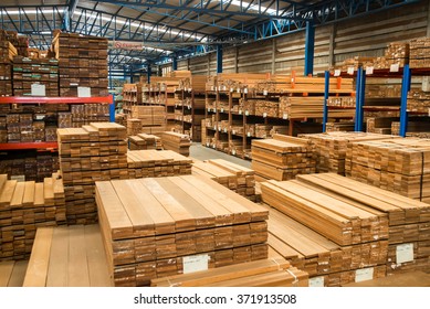 timber in warehouse - Shutterstock ID 371913508