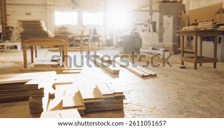 Timber, wood and carpentry in empty workshop for furniture manufacturing, renovation and labor. Materials, plank and crafting production with woodwork, remodeling maintenance and restoration industry