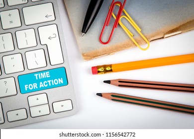 Time For Action, Marketing Concept. Computer Keyboard On A White Office Desk With Various Items