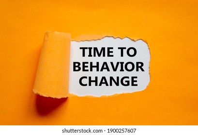 Time to behavior change symbol. The text 'Time to behavior change' appearing behind torn orange paper. Business, growth and time to behavior change concept. Copy space. - Shutterstock ID 1900257607