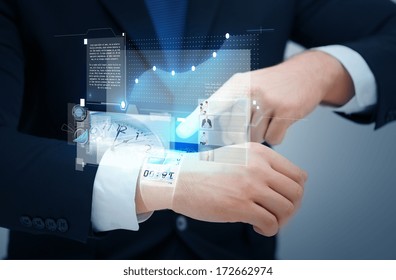 time, business and new technology concept - close up of businessman pointing to something at his hand