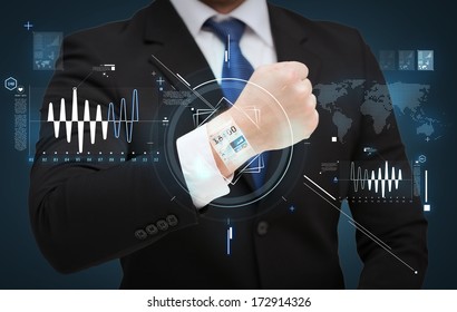 time, business and new technology concept - close up of businessman showing something at his hand