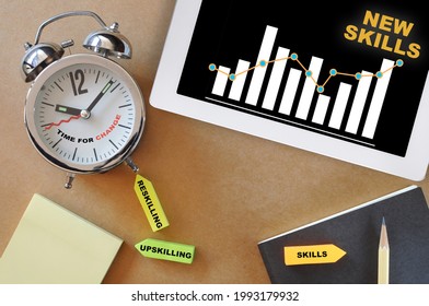 Time For Change Concept And Self Improvement With Reskilling And Upskilling Idea. New Skills And Growth Graph On Computer Digital Tablet On Working Deak