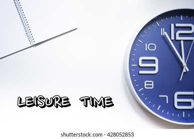 Time concept: Clock and notepad