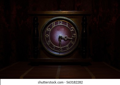 Time concept - vintage wood clock face with grunge texture at dark red maroon curtain background, - Powered by Shutterstock