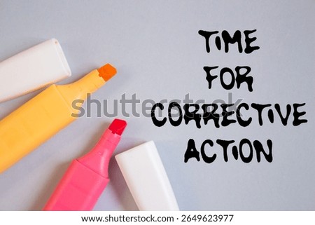 Time for corrective action message written on grey background with colorful marker pens. Conceptual time for corrective action symbol. Copy space.