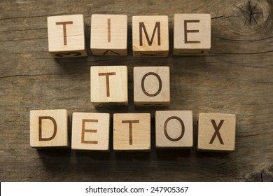Time To Detox text on a wooden cubes on a wooden background