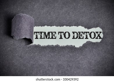 Time To Detox Word Under Torn Black Sugar Paper.