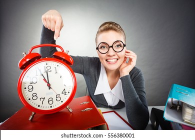 Time Employment Paperwork Concept. Office Lady Pointing At Clock. Young Secretary Showing Alarm Ringer At Desk In Bureau.