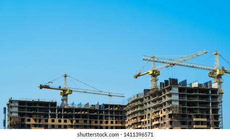 Time Lapse Construction Cranes And Workers Build A Multi-storey Building