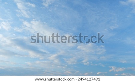 Time lapse. Formation cloud sky scape. Various layers of clouds move in different directions at altitude.