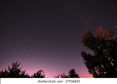 Time lapse image of stars rotating around Polaris; The North Star.