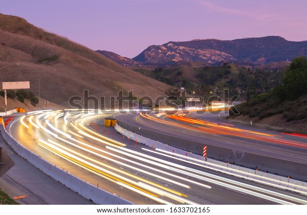 Time\
Lapse Los Angeles Highway 101 Freeway Dolly Day to Night California\
Through Fence 4K 4444 colourspace from 6K\
source