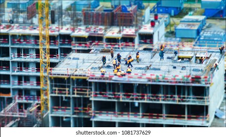 Time Lapse Tilt Shift Builders And Cranes Working On The Construction Site Close Up