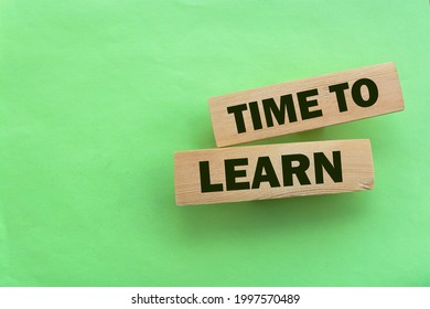 Time To Learn On Wooden Blocks Put Black. Education Concept. Life-time Learning Business Concept.