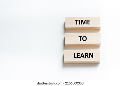 Time To Learn On Wooden Blocks Put Black. Education Concept. Life-time Learning Business Concept.