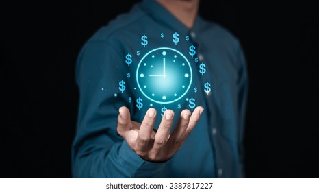 Time management concept, businessman holding clock and money icon on interface virtual for business time management. time is money, work planning increases efficiency and reduces work time.