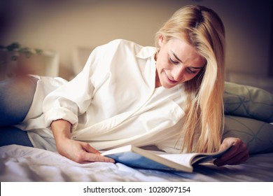 Time For Me. Young Woman Riding Book. 