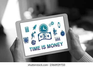 Time is money concept shown on a tablet held by a woman - Shutterstock ID 2366929733