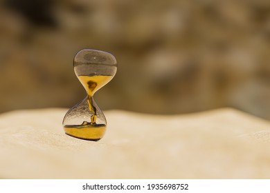 Time Is Money, Hourglass In The Desert, Symbol Of How Valuable Our Time Is, It Can Be Used In Backgrounds