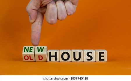 Time to new house. Hand turns cubes and changes words 'old house' to 'new house'. Beautiful orange background. Business and new house concept, copy space. - Shutterstock ID 1859940418