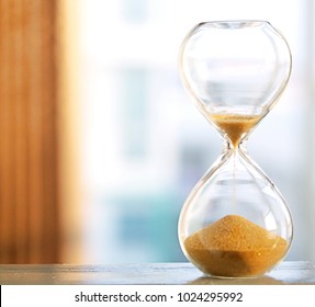 Time Passing Concept,urgency And Running Out Of Time. Sand Fall In Hourglass