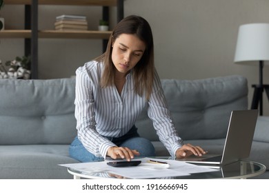 Time To Pay Bills. Concentrated Woman Pay Domestic Utilities At Online App Calculate Fee Work With Financial Papers. Young Lady Owner Renter Tenant Of House Flat Engaged In Housekeeping At Home Office