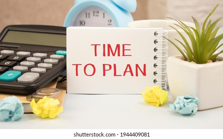time to plan- text on the notepad with calculator - business, banking, finance and investment concept