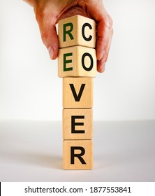 Time To Recover Symbol. The Word 'recover' On Wooden Cubes. Male Hand. Beautiful White Background, Copy Space. Business And Recover Concept.