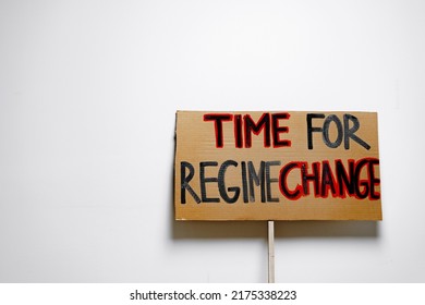 'Time For Regime Change' Protest Placard Close Up