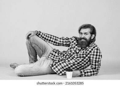 time to relax. mug with beverage. drinking tea or coffee. good morning. morning vibes at home. concept of inspiration. hipster man drink coffee. handsome bearded man holding a white cup