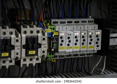Time relays side by side in the switchboard. - Shutterstock ID 1983642542