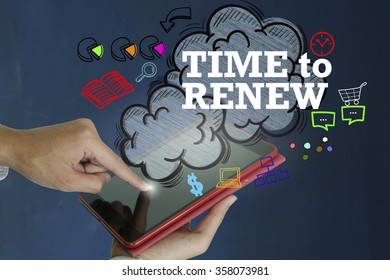 TIME TO RENEW over a tablet computer on dark blue background , business concept ,business idea