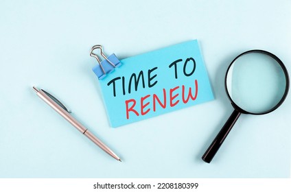 TIME TO RENEW Text Written On A Sticky With Magnifier And Pen, Business Concept