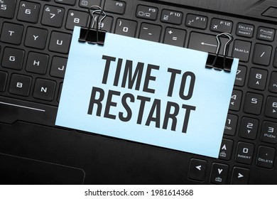 Time To Restart Inscription On White Paper Note On Laptop Keyboard. Closeup Message.