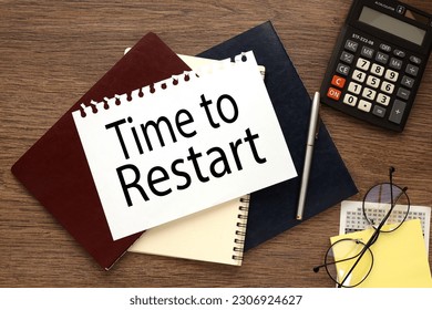 time to restart text on page in notepad desktop calculator glasses - Shutterstock ID 2306924627