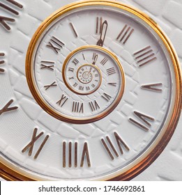 Time running in a spiral. Infinity of time. Infinite fractal dial of a gold watch.