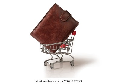 Time for shopping. Supermarket trolley with wallet. On white background.